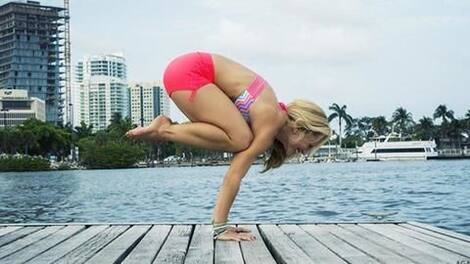 Bakasana: This advanced-level pose will help you reduce weight